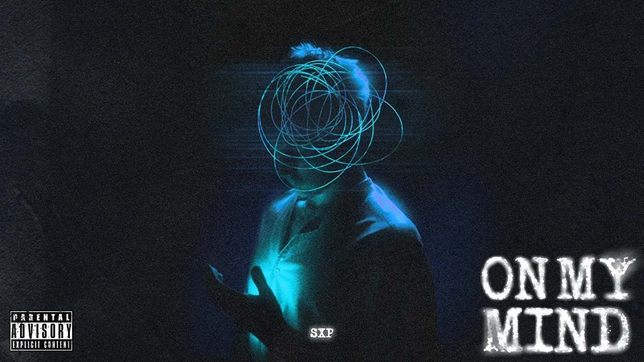 Video thumbnail: the figure centred in night-navy, ON MY MIND large at the bottom right and a Parental Advisory mark at the bottom left.